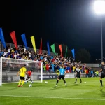 Exciting soccer picks action with players in motion on a lively pitch.